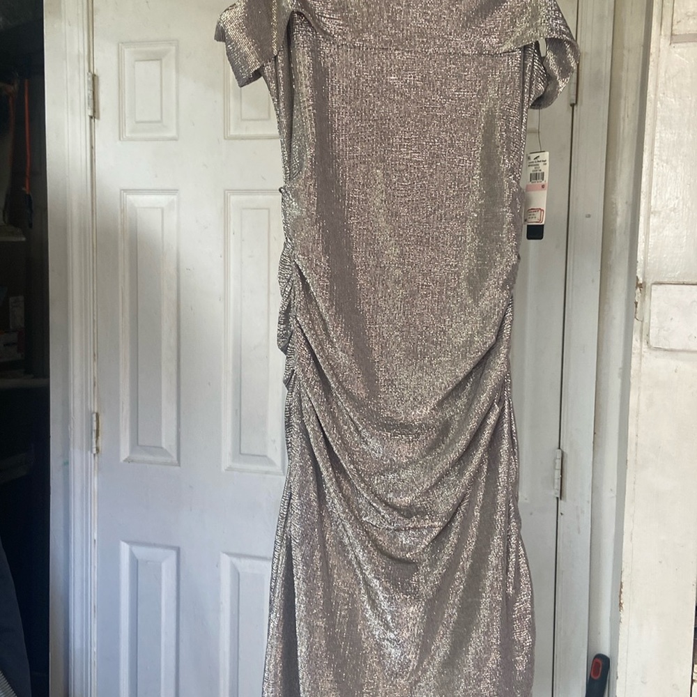 Dress from Laundry never wore, brand new so cute size was bigger to me